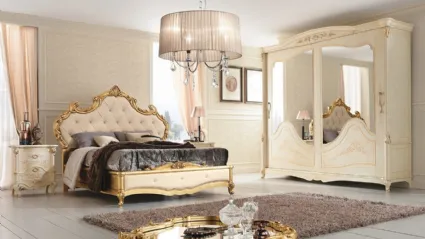 Letto con testiera in ecopelle con rifiniture in legno intagliato e dorato Romantica di Adriatica