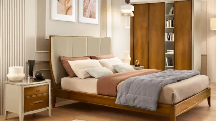 Letto Armonia in legno con testiera in pelle di Le Fablier