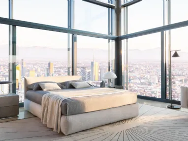 Letto matrimoniale in tessuto imbottito con contenitore Merkurio di Flou