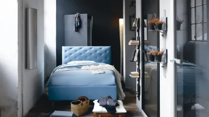 Letto singolo in ecopelle con testiera capitonné e contenitore So Ever di Noctis