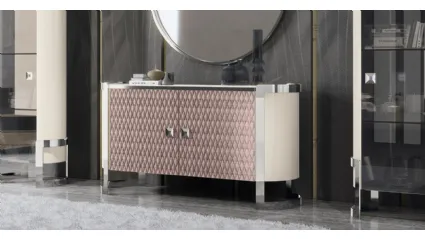 Madia Kursaal in laccato lucido e tessuto trapuntato di Adriatica